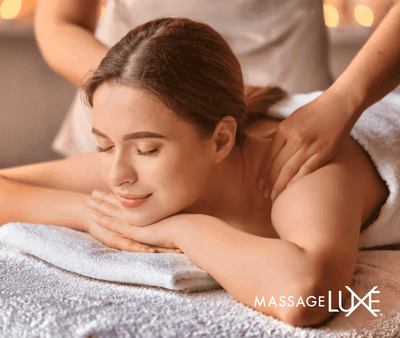 MassageLuXe case study — woman receiving a relaxing massage